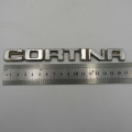 Pair of Vintage Ford Cortina badges