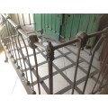 Vintage cast iron baby cot (on wheels) - Black