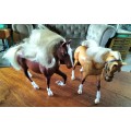 Two Plastic Toy Horses