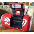 Vintage plastic camera in shape of Coca Cola can