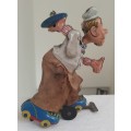 Vintage tin toy - humorous waiter on wheels