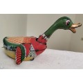 Vintage tin toy - duck on wheels