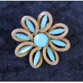 Lovely Vintage turquiose blue stone set in gold coloured brooch