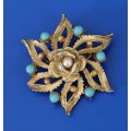 Vintage gold colour brooch with faux pearls and turquoise stones