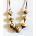 Vintage Ethnic Clay Bead Neclace on leather string. 75cm.