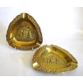 Two Vintage Solid Brass Picture Embossed Ashtrays.