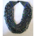 Unusual Beaded Multi-Strand Long Ethnic Necklace 38 strings. Gorgeous