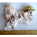 Two Antique Small Porcelain Dolls Arms and Legs Attached by an Elastic Band. Size as per photo.