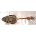 Vintage Embossed Cake Lifter.  Made in Holland. 17cm long.