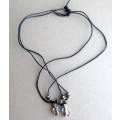 Costume Leather Necklace with Penquin Pendants.