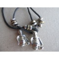 Costume Leather Necklace with Penquin Pendants.