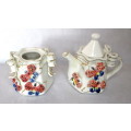 Lovely Delicate Porcelain Ribbon Milk Jug and Sugar Bowl. Made in China