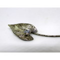 Dainty Vintage Silver Color leaf and diamante hat or shoulder pin. 95mm long.