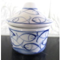 Small Blue and White handpainted ring/pin dish with lid.  No Marked with makers mark. 65mm high.