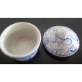 Small Blue and White handpainted ring/pin dish with lid.  No Marked with makers mark. 65mm high.