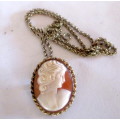 Shell Cameo pendant/brooch with chain. 2.5 cms x 3 cms. Signed PS CO 1/20 10K GF