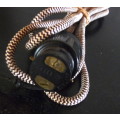 Vintage Electrical cord with light connection.