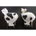 Salt and Pepper Shakers. Cow themed.  Spotless.