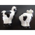 Salt and Pepper Shakers. Cow themed.  Spotless.