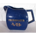 Vintage Dark Blue `Connoisseur V.O Superior Brandy` ceramic water jug with an ice lip. 130mm high.