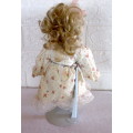 Vintage Soft Body Porcelain Doll. Very Beautiful with Original Clothes. Ons Stand.300mm high.