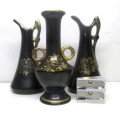Three Black and Gold Baibua hand decorated mini vases. 85mm high.