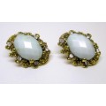 Vintage faceted cat eye light blue and clear stone earrings. 25mm.