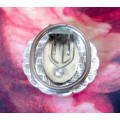 Vintage Stylish Scarf Clip. Mother of Pearl in a Marcasite and ornate silver color setting. 30mm dia