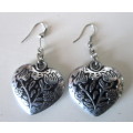Costume Jewelry. Large Silver toned heart hanging Earrings.