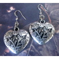 Costume Jewelry. Large Silver toned heart hanging Earrings.