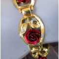 Vintage Romantic 7 Rose Bracelet. Metal unknown. Please refer to photos for condition. 20cm