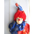 Vintage Hanging Porcelain Face Clown Doll with Red Hair, on a swing. Doll 400mm long