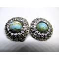 Vintage Ornate Turquoise Speckled Cabochon set in silver color metal with marcacites. Clip on.