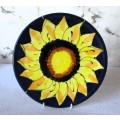 Hand painted glazed Sunflower wall hanging plate.  200mm diameter.