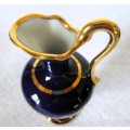 Vintage stunning Limoges jug is a rich cobalt blue hand embellished with gold. Marked. 150mm high.