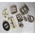 Assortment of 9 Vintage Belt Buckles, different sizes.