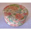 Vintage Valeur round Powder container, covered with material, contains some vintage jewelry.