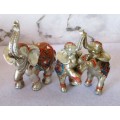 Lot of 3 Elephant Statues With Exotic Designs Saddle And Headpiece.  12x6x13cm biggest one. Repaired