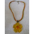 Sunny Resin Flower with leather string necklace. 40cm string 6cm diameter flower.