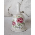 Lovely Vintage Porcelain Bell hand painted with roses. No chips or craks.