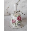 Lovely Vintage Porcelain Bell hand painted with roses. No chips or craks.