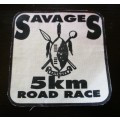 SAVAGES 5km road race badge.
