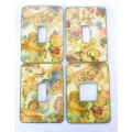 Four vintage themed light switch covers. Docrative.