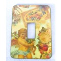 Four vintage themed light switch covers. Docrative.