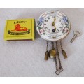 Vintage Wintermantel Germany Mini Porcelain Enamel Face Wall Clock with Key. Overwound. Photo scale.