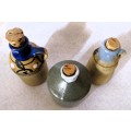 Lot of 3 Vintage Stoneware Jugs with cork. bigger 120mm high.