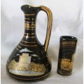 Two Strigosand Mantigos  Greek 24k Gold decorated Black Vases Pitchers. 130mm high.