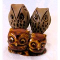 Lot of three caly and porcelain Owl figurenes.