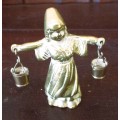 Antique brass figurine girl carrying two milk baskets. Marked.