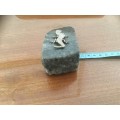 SA mining silver Gecko sitting on rock